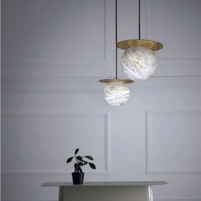 Alabaster Sphere Pendant Light Above Bed - Image 5