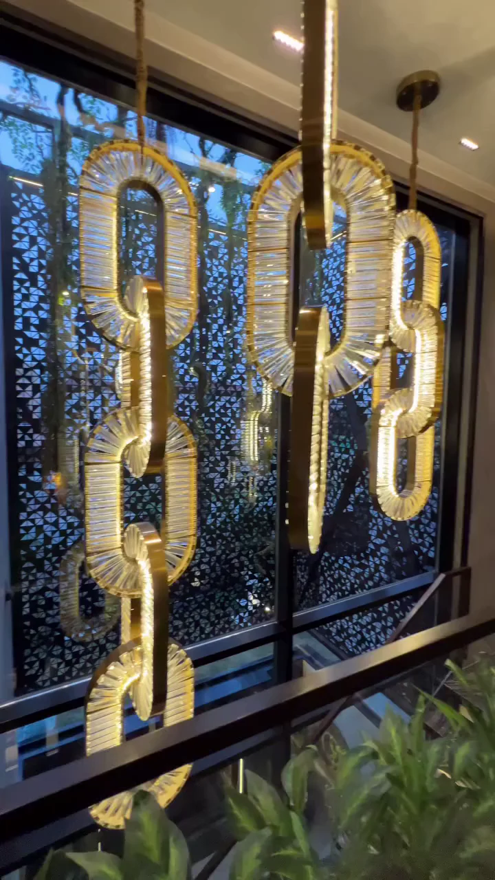 Luxury Crystal and Metal Chain Pendant Chandelier for High Ceilings with Modern Finish - Image 4